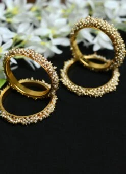 Golden Plated Off White Alloy Beads Bangles Party Wear